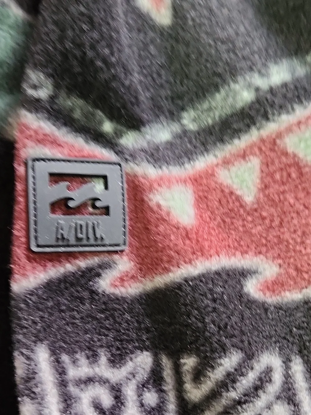 Billabong Black Fleece Zip-Up Sweater with Red & Green Pattern